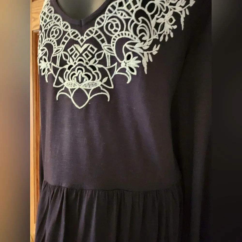 Elegant Black Dress with White Lace Detail